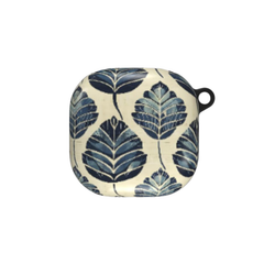Round ceramic dish with blue leaf pattern on a white background