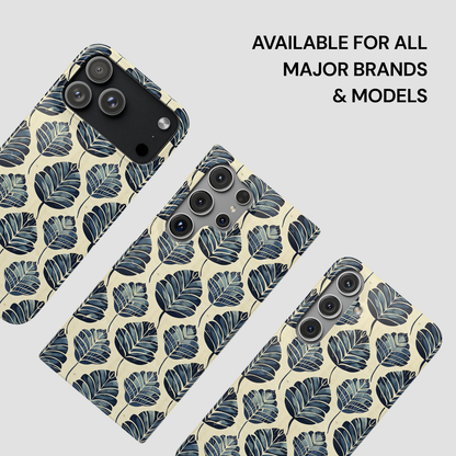 Phone case with leaf pattern on a light gray background