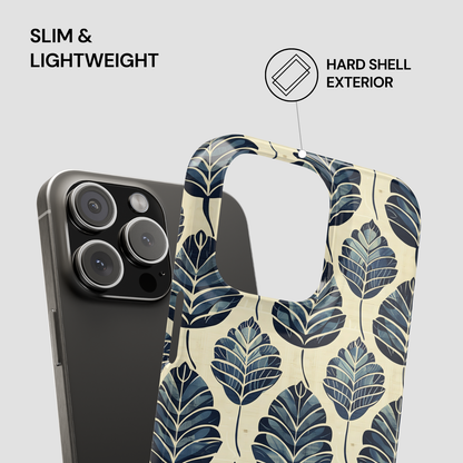 Phone case with leaf pattern and text highlighting features on a gray background