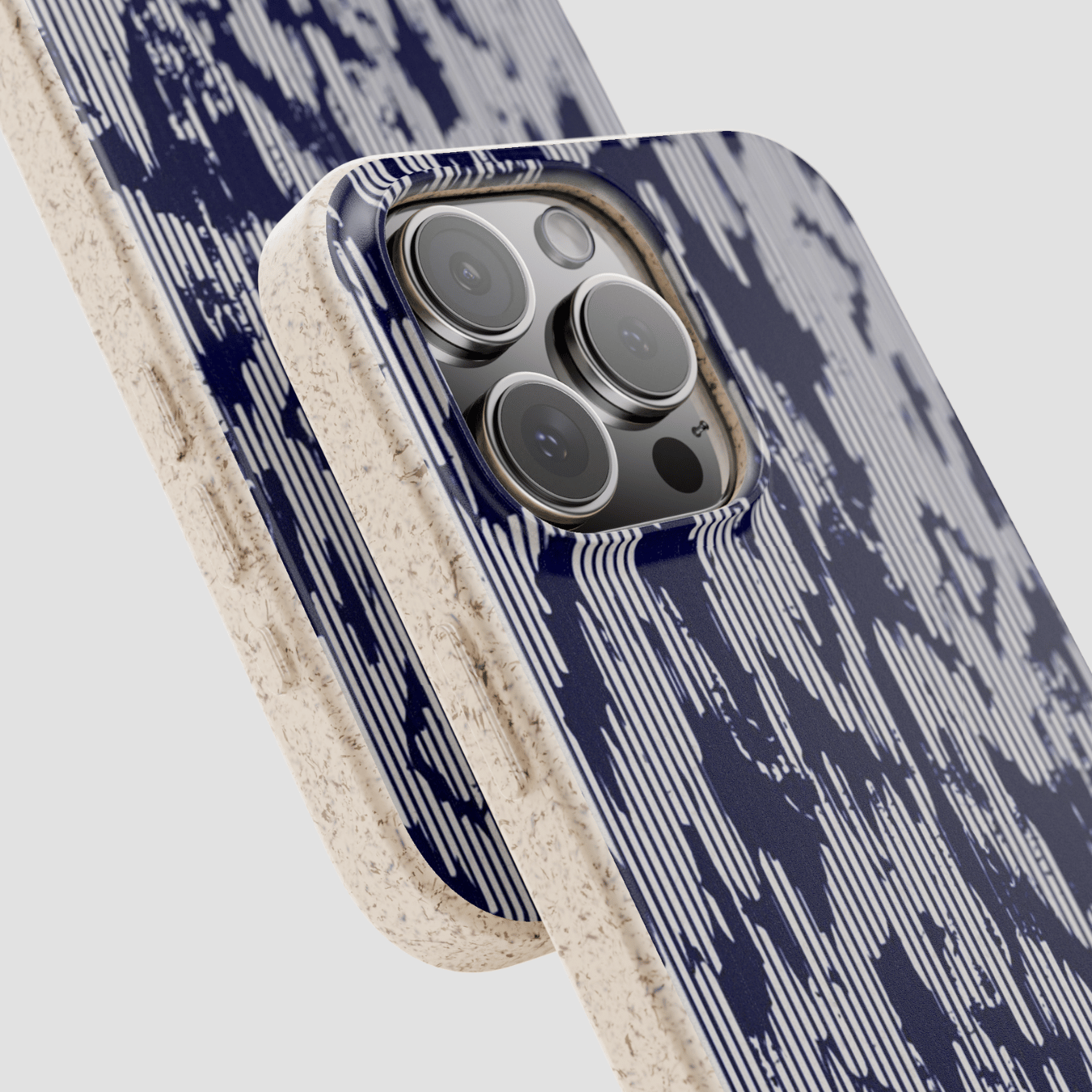 Phone case with blue abstract pattern and beige border on a light gray background