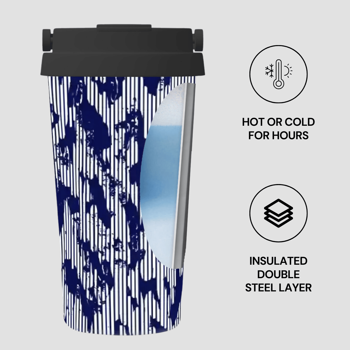 Insulated tumbler with blue abstract design and black lid on a light gray background