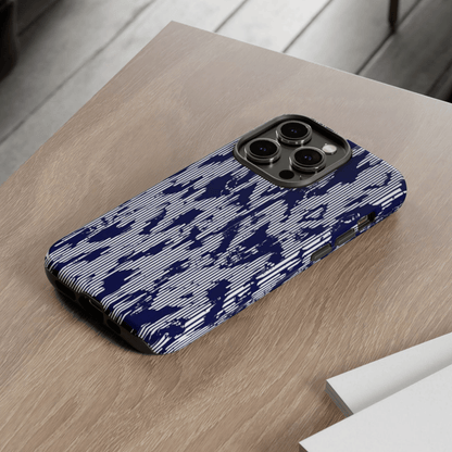Blue camouflage phone case on a wooden surface