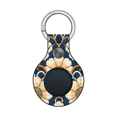 Decorative keychain with floral pattern on a white background