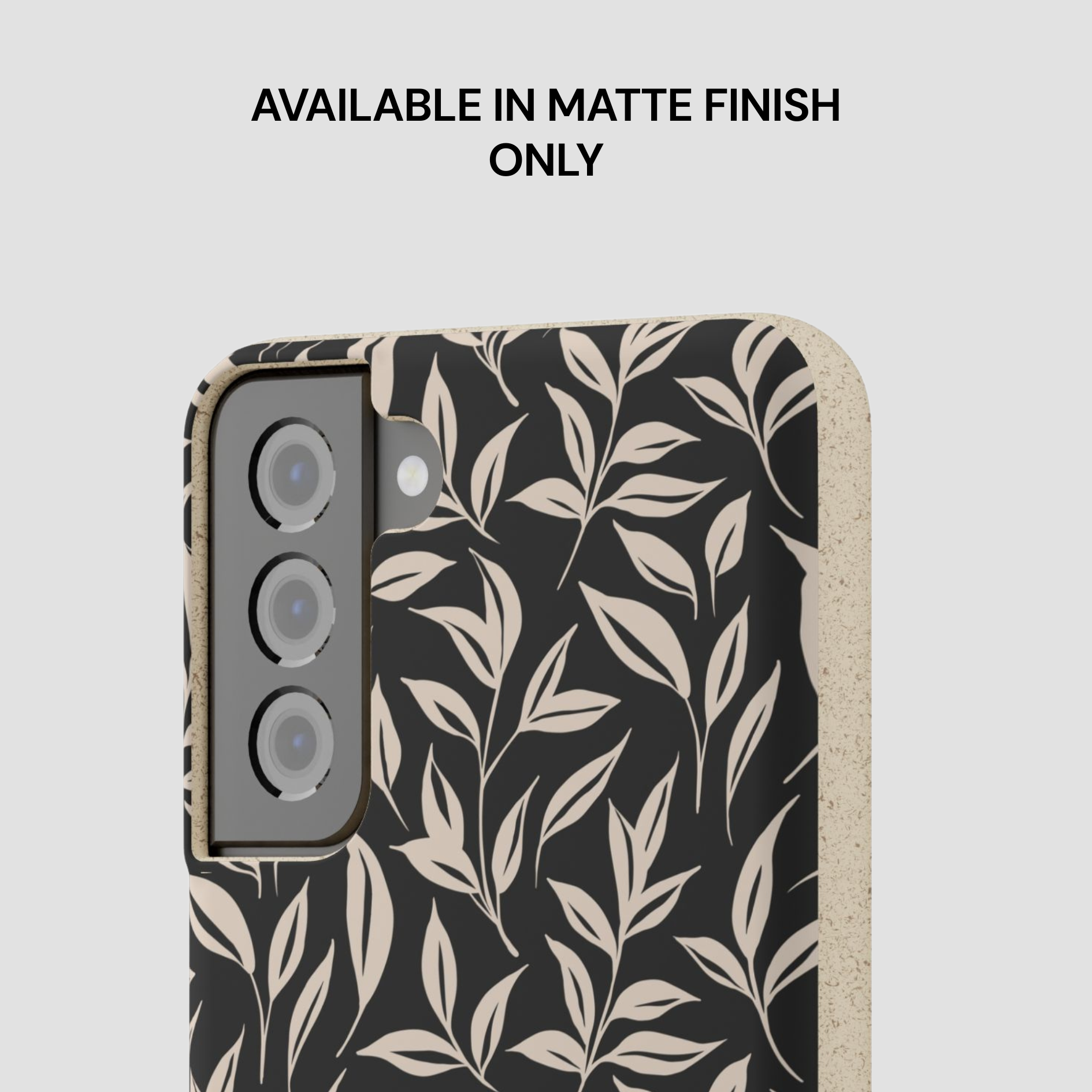 Phone case with leaf pattern on a light gray background