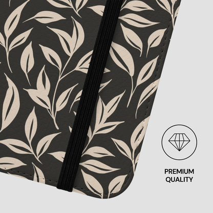 Patterned product with leaf design on a black background, featuring a 'Premium Quality' label.