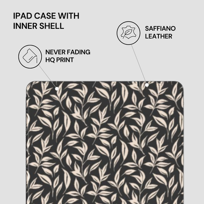 Saffiano leather iPad case with leaf pattern on a light gray background