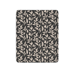 Patterned fabric with leaf design on a black background