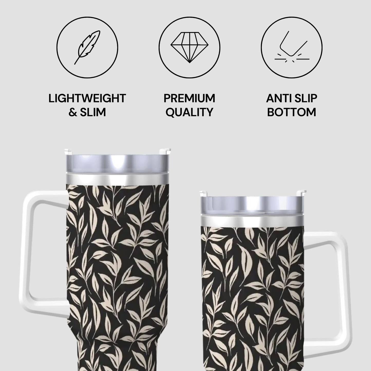 Two travel mugs with leaf pattern and text indicating features on a light gray background