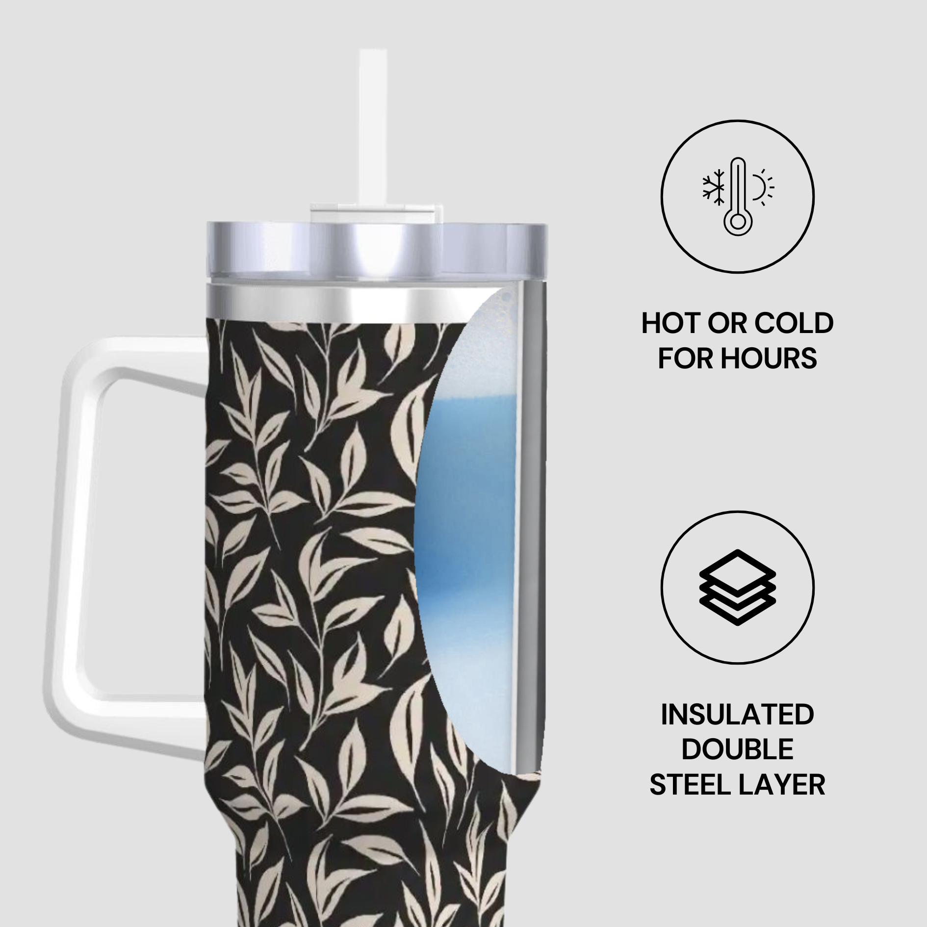Insulated tumbler with leaf pattern on a white background