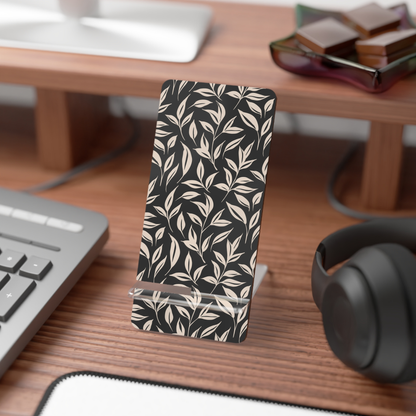 Phone case with leaf pattern on a desk with keyboard and headphones