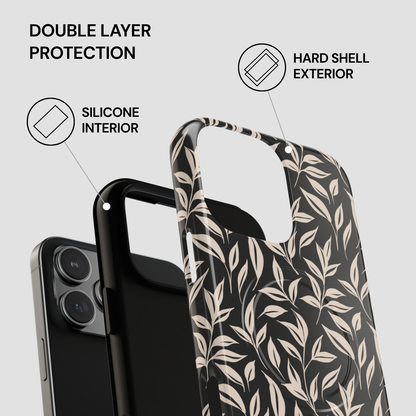 Colorful phone case with hard shell exterior and silicone interior on a gray background
