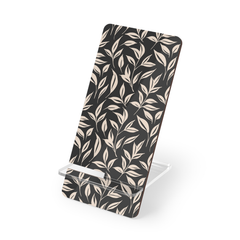 Phone stand with leaf pattern on a white background