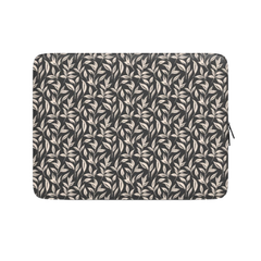 Laptop sleeve with leaf pattern on a white background
