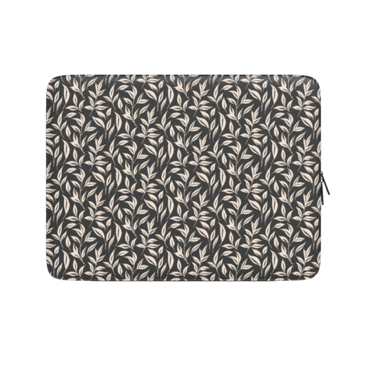 Laptop sleeve with leaf pattern on a white background