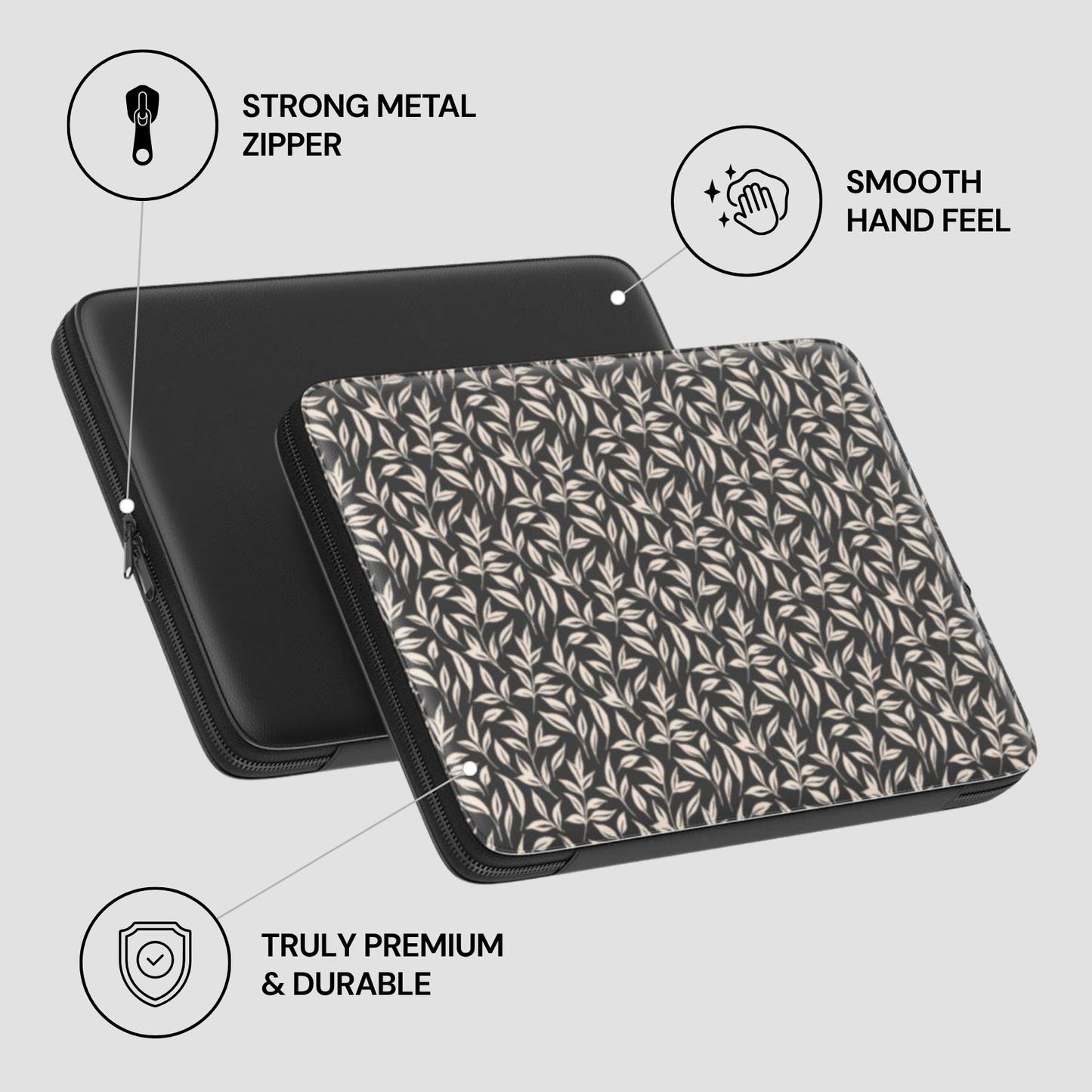 Patterned laptop sleeve with black metal zipper on a light gray background