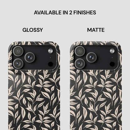 Phone case with leaf pattern in glossy and matte finishes on a white background