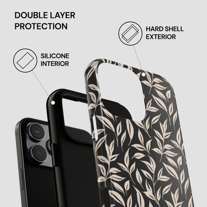 Colorful phone case with hard shell exterior and silicone interior on a gray background