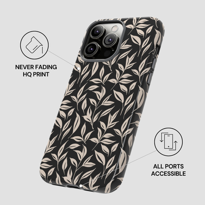 Phone case with leaf pattern on a light gray background
