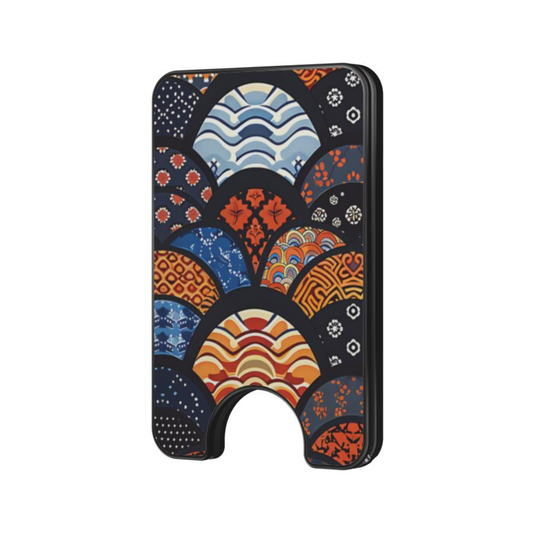 Kimono Wave magnetic wallet with navy, blue, orange, and cream patterned design on a plain background