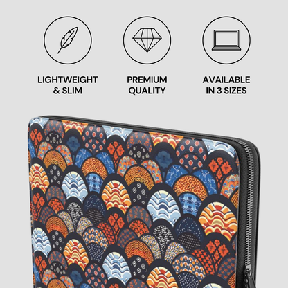 Colorful patterned laptop sleeve with icons and text on a light gray background | Casenari