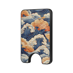 Kumo Nami magnetic wallet with blue, cream, and warm orange wave pattern on a plain background