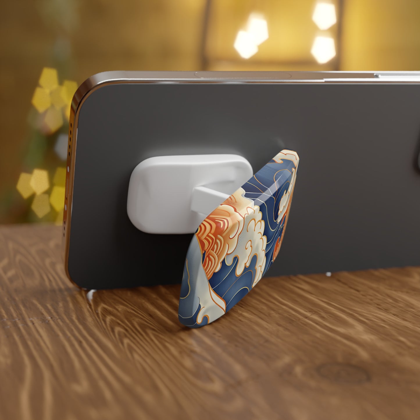 Phone holder with decorative design on a wooden surface