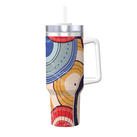 Colorful insulated mug with handle and straw on a white background