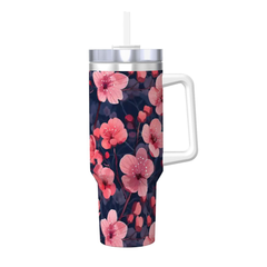Floral-patterned tumbler with a handle on a white background