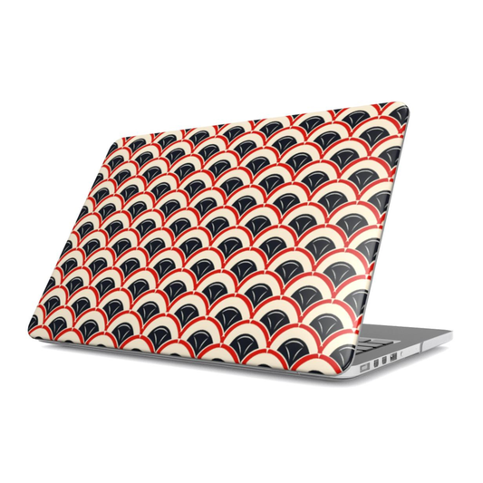Laptop with a geometric patterned skin on a white background