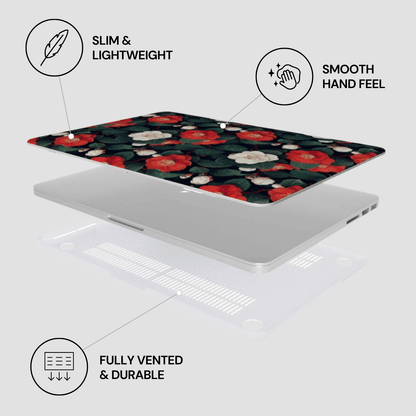 Laptop with floral design on a white background, featuring text labels about features.
