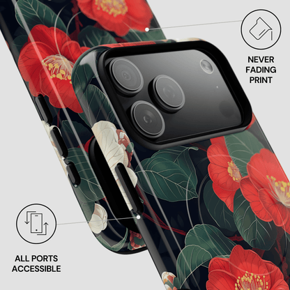 Phone case with red floral design on a gray background