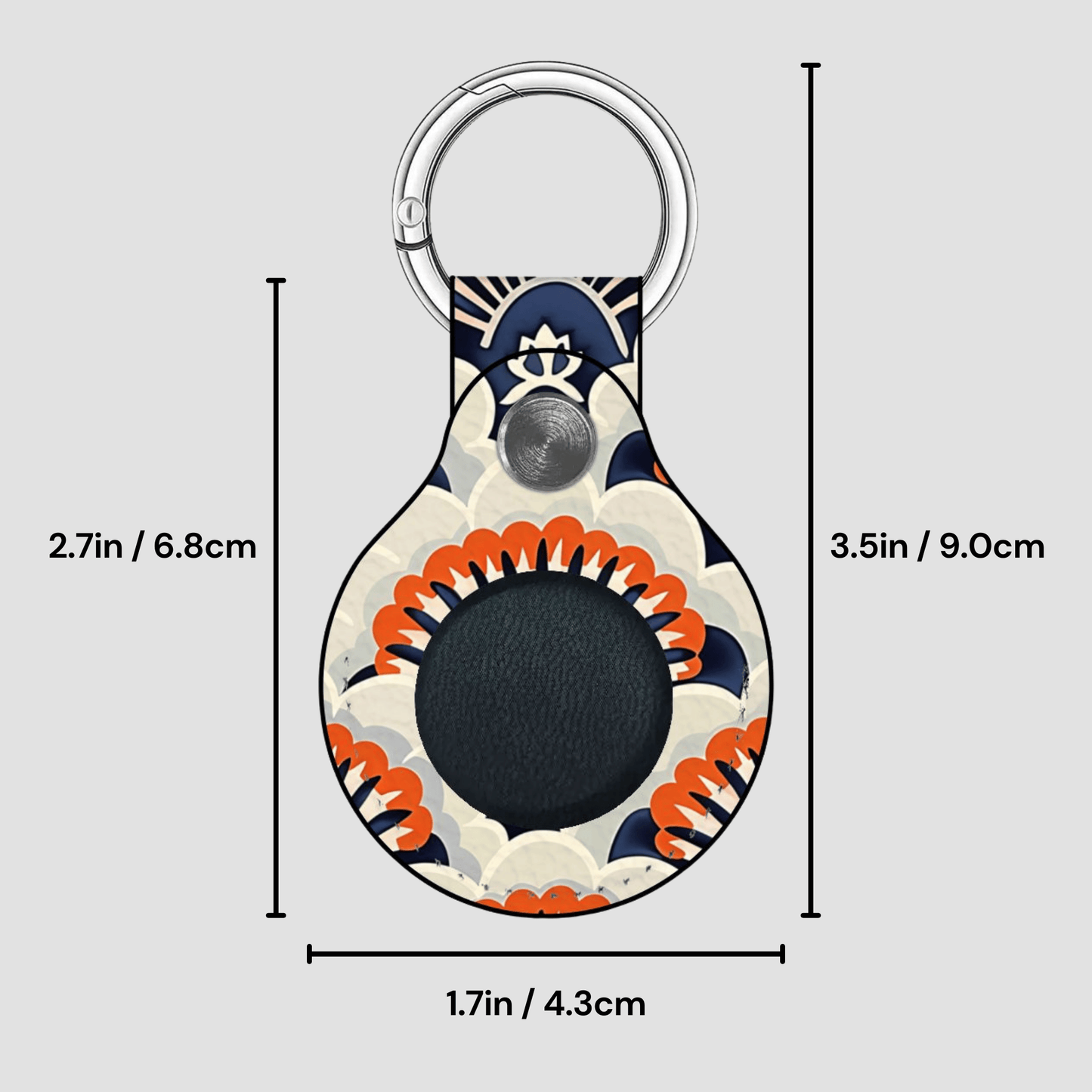 Decorative keychain with measurements on a gray background