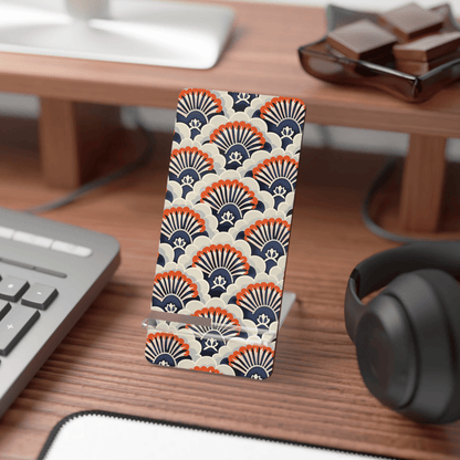 Phone case with geometric pattern on a desk with keyboard and headphones