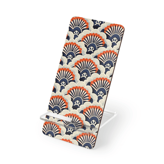 Phone stand with shell pattern on a white background