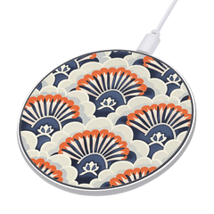 Wireless charging pad with floral pattern on a white background