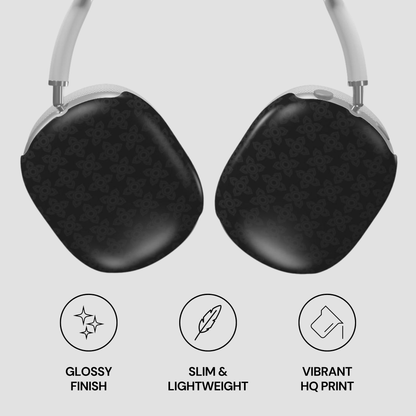 Black headphones with glossy finish, slim design, and vibrant HQ print on a light gray background.