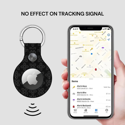Smart keychain with Apple logo and phone displaying location app on gray background