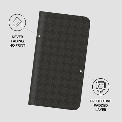 Black patterned notebook with text indicating 'Never Fading HQ Print' and 'Protective Padded Layer' on a light gray background.