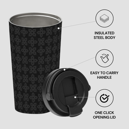 Black insulated steel tumbler with handle and one-click lid on a light gray background