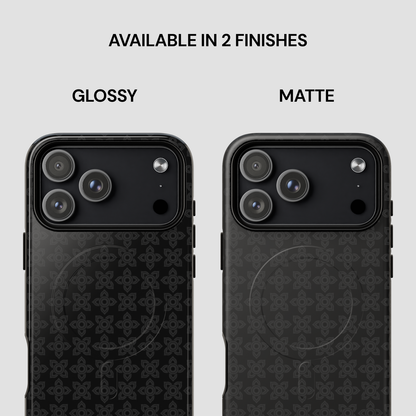 Two black phone cases, one glossy and one matte, on a light gray background.
