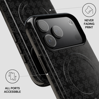 Black phone case with patterned design on a light gray background