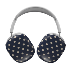 Navy blue headphones with white polka dots on a white background