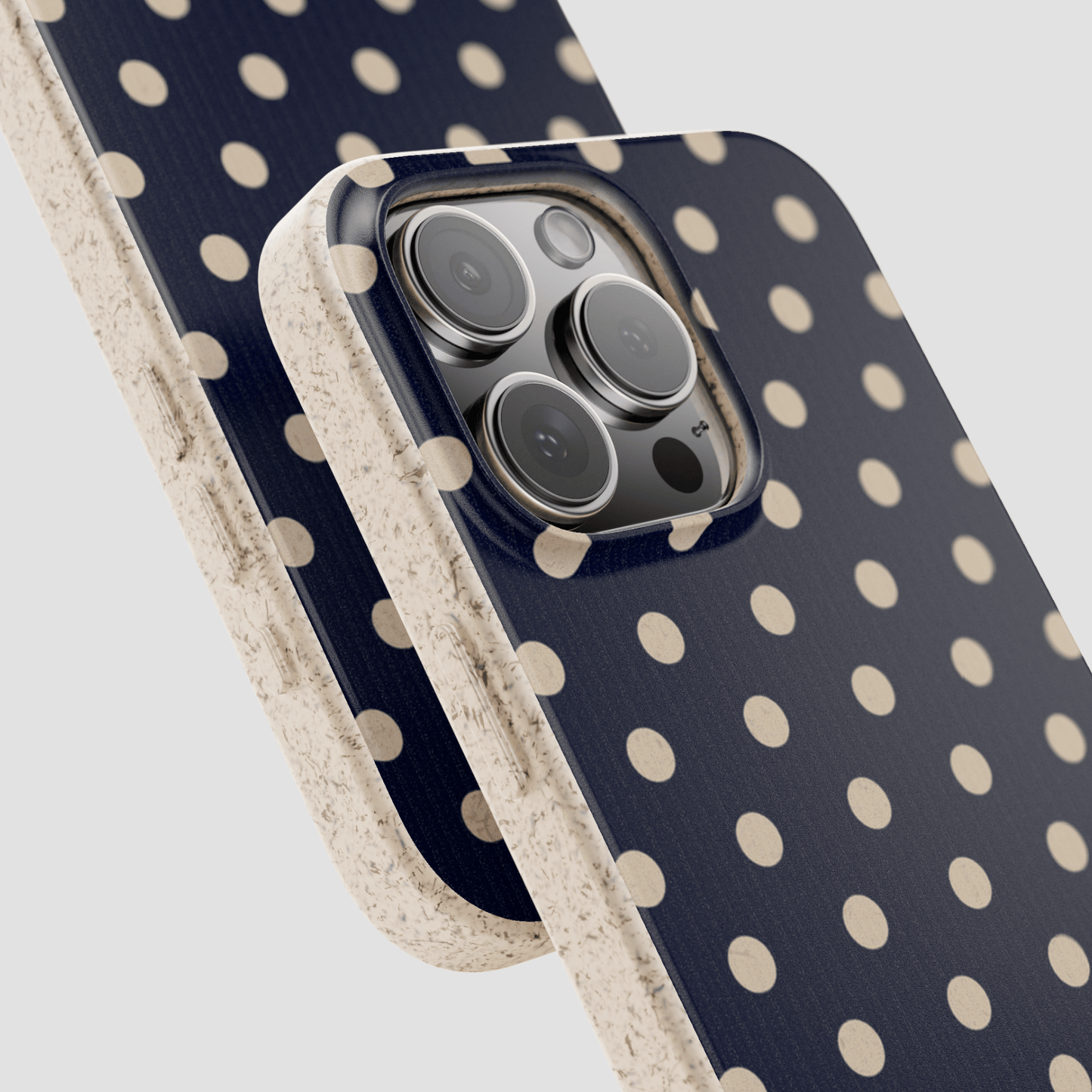 Phone case with polka dot pattern on a white background