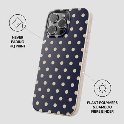 Phone case with polka dot pattern on a gray background