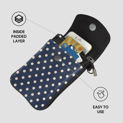 Polka dot phone case with card slots on a gray background