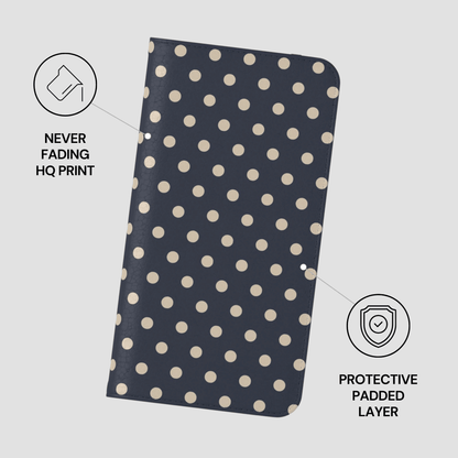 Polka dot notebook with protective features on a light gray background