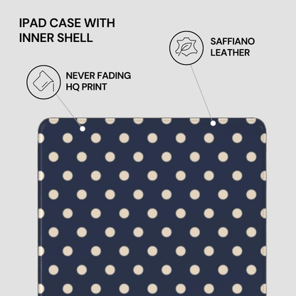 Navy blue iPad case with white polka dots on a gray background