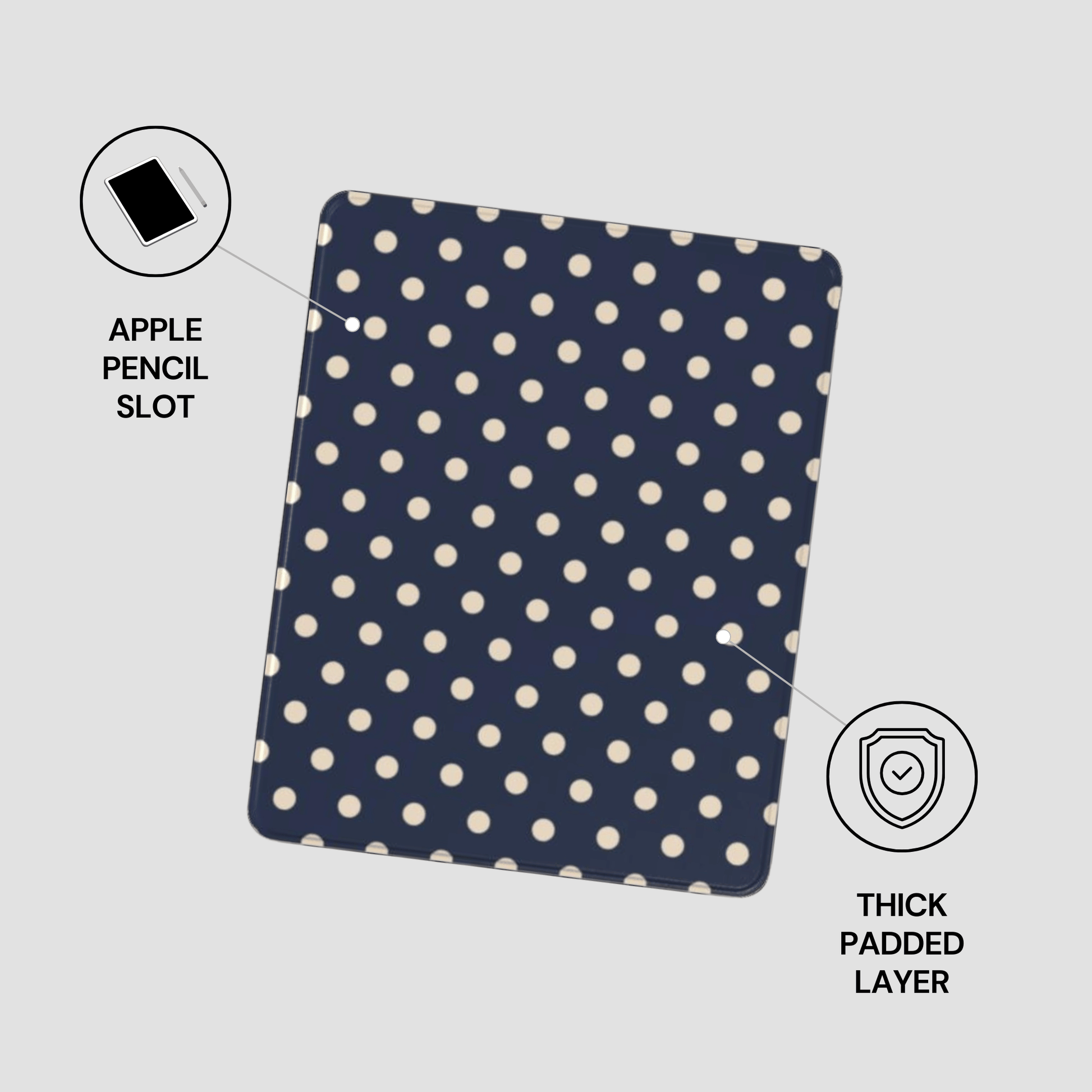 Navy blue case with white polka dots featuring an Apple Pencil slot and thick padded layer on a light gray background.