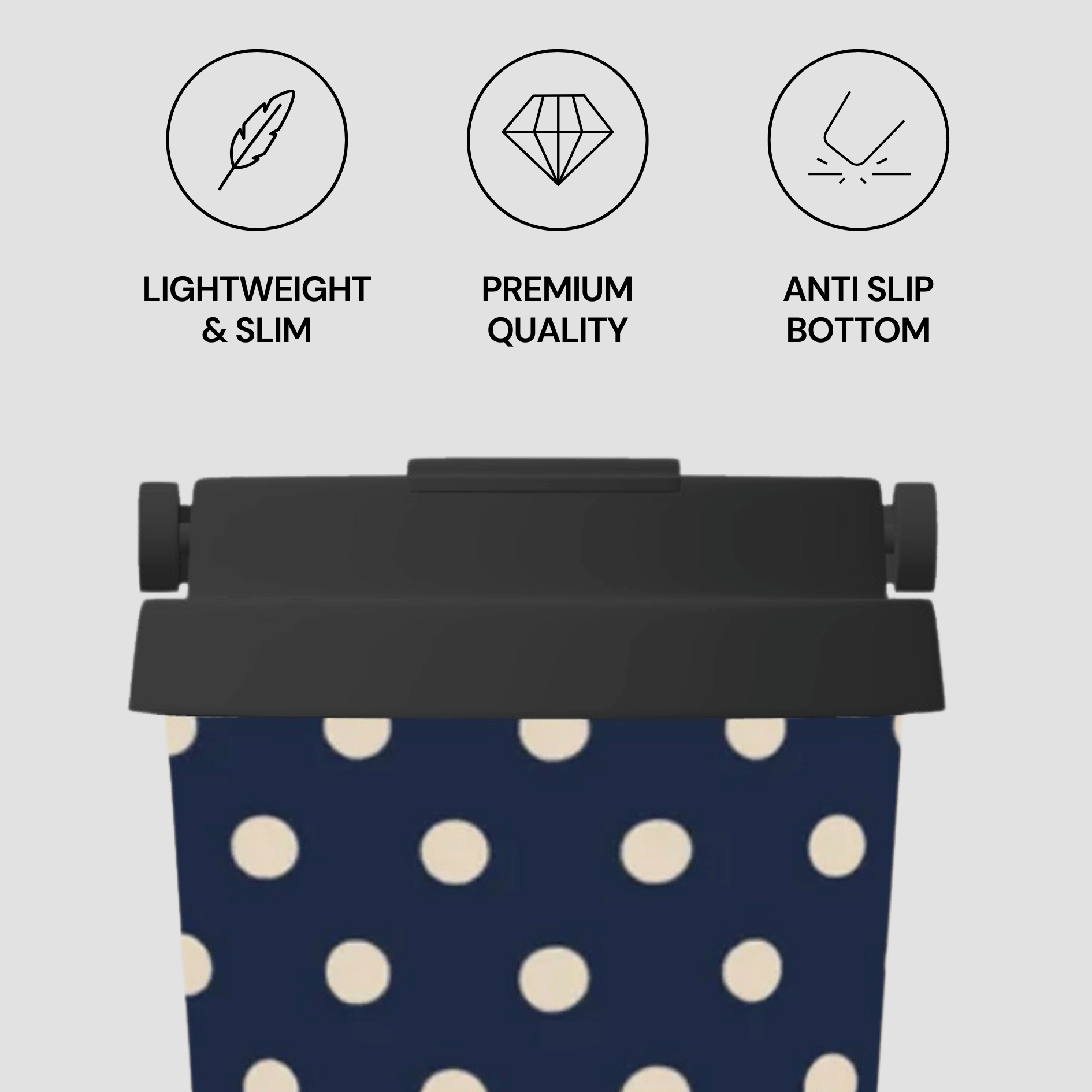 Navy blue tumbler with white polka dots and black lid on a light gray background with feature icons and text.