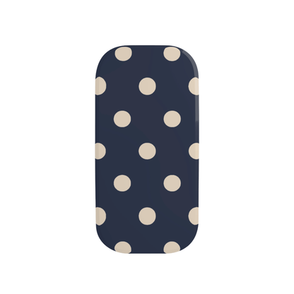 Phone case with a navy background and beige polka dots on a white background